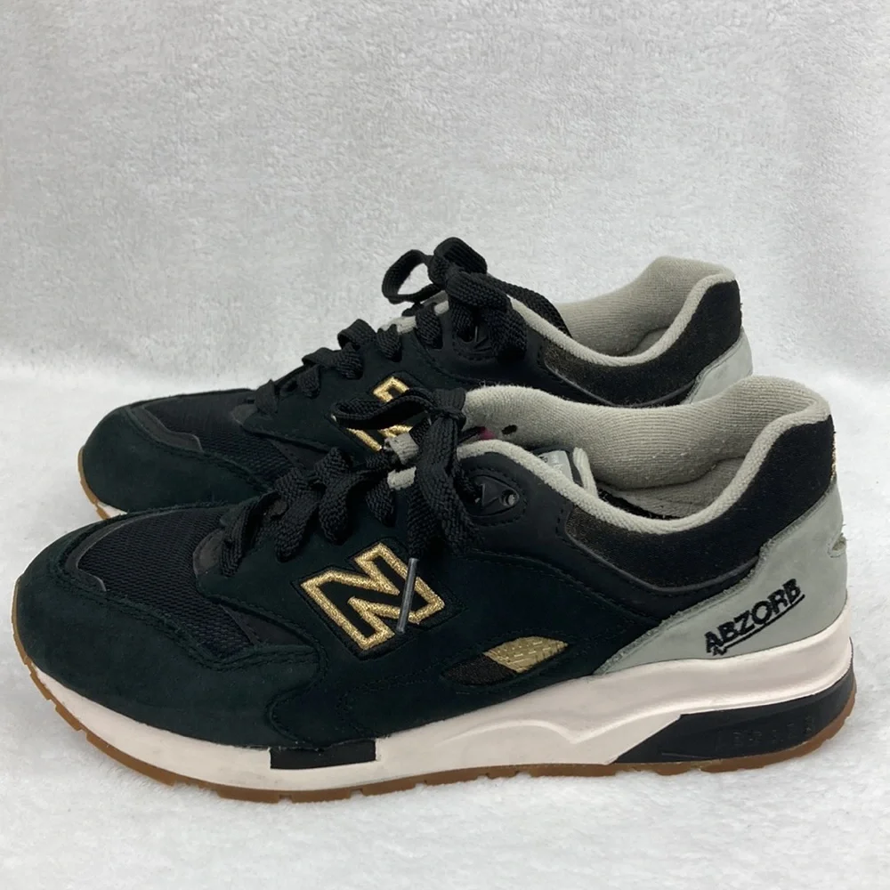 New Balance Women’s Abzorb Black and Gold Sneakers sz 6.5